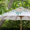 Colorful, hand painted, custom patio umbrella in pink, green, orange, chartreuse and white - by Pearl & Maude