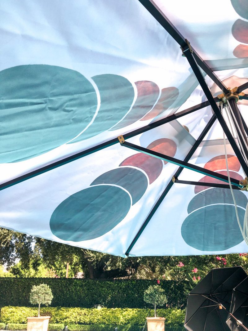 detail of a poolside custom patio umbrella