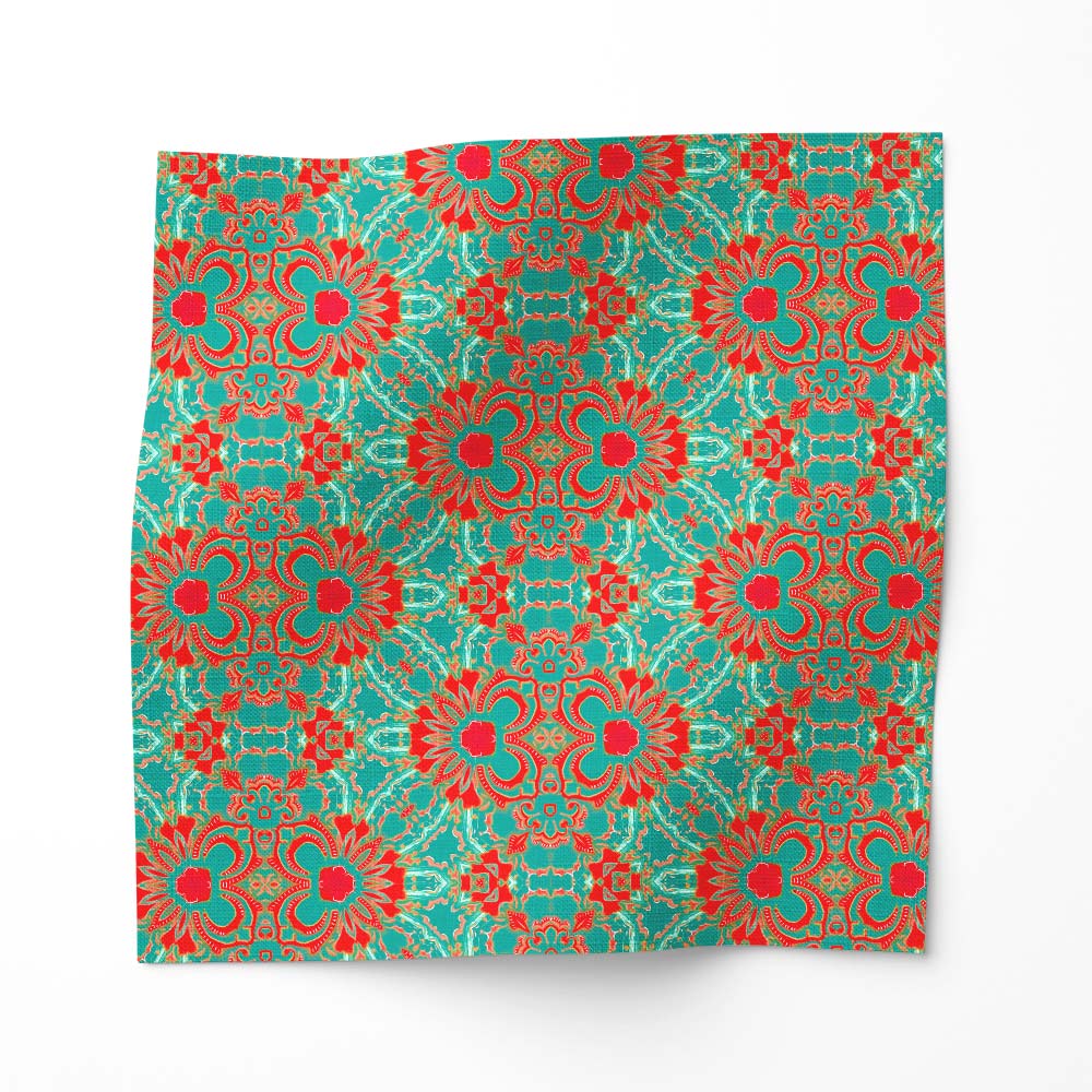 Carmen in turquoise and crimson is an abstract, geometric botanical patterned print.