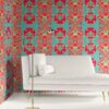 A bold, modern arts and crafts room with white furniture and coral and turquoise William Morris inspired wallpaper by Peale and Maude