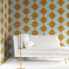 Desert Diamonds in dusty blue, orange and olive is a modern, colorful luxury wallpaper designed in Los Angeles. Design - Desert Diamonds by Pearl and Maude. Vellum wallpaper comes untrimmed.