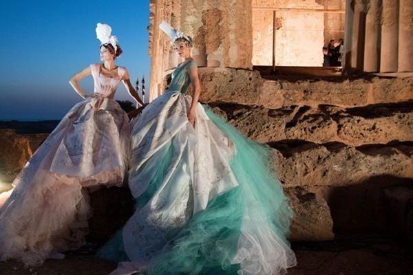 peaceful fashion show in ancient greek temple with the golden light of autumn