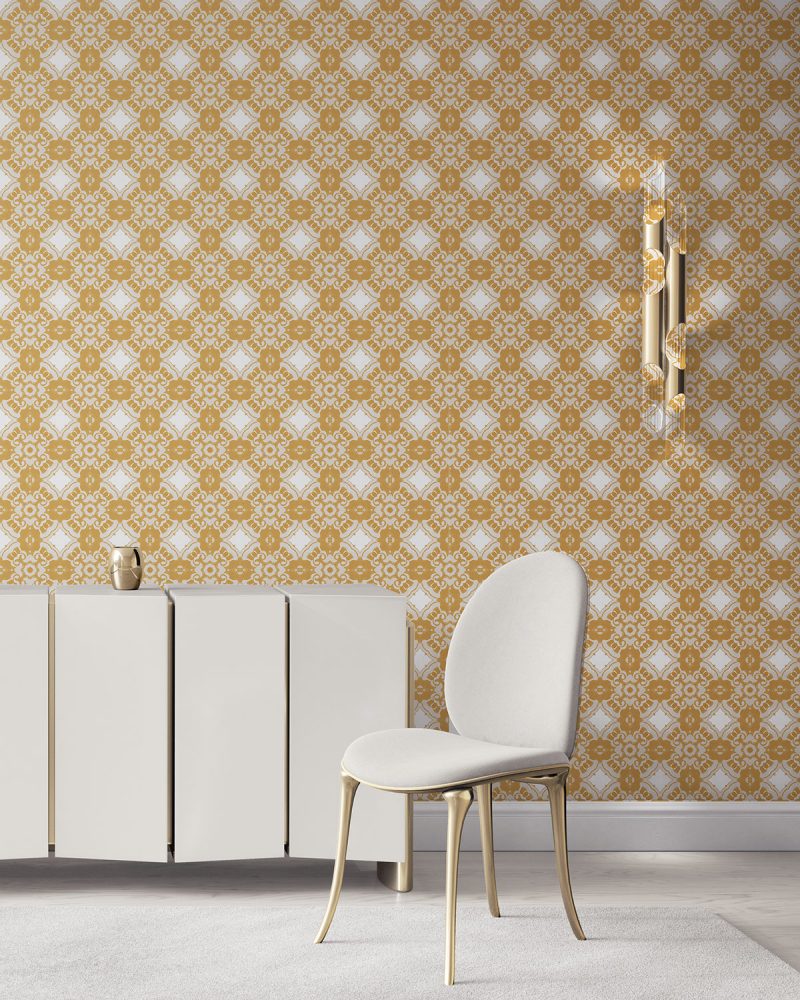 Pearl & Maude's Alexandria medallion prepasted wallpaper in daisy yellow, cream and white installed in a beautiful living room with white and brass furniture.