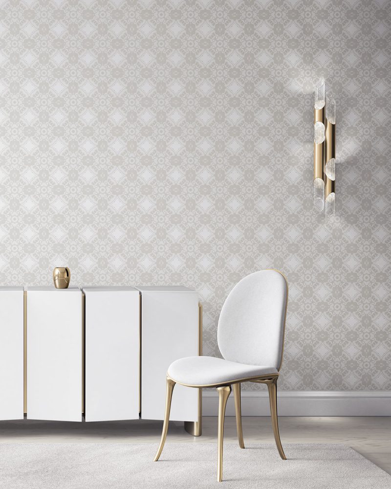 Pearl & Maude's Alexandria medallion prepasted wallpaper in neutral cream and white installed in a beautiful living room with white and brass furniture.