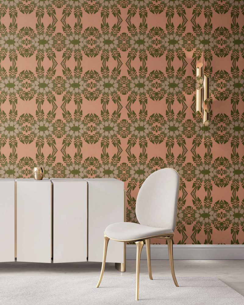 Pearl & Maude's tropical botanical Artemis nonwoven vellum wallpaper in dark clay pink and moss green installed in a beautiful living room with white and brass furniture.