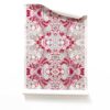 A roll of Carmen grey and magenta botanical wallpaper featuring abstract floral patterns in neutral grey and vibrant magenta, perfect for bold and artistic interiors.