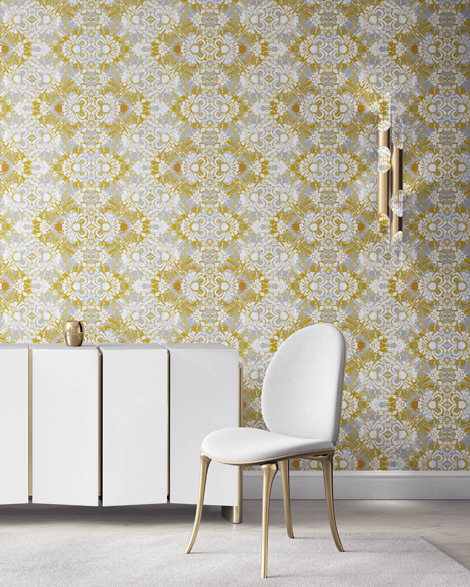 Pearl & Maude's abstract botanical Carmen nonwoven vellum wallpaper in daisy yellow, white and grey installed in a beautiful living room with white and brass furniture.