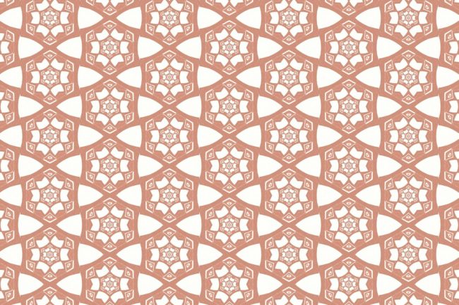A detail swatch Pearl & Maude's small hexagon Cora nonwoven wallpaper in pink and white