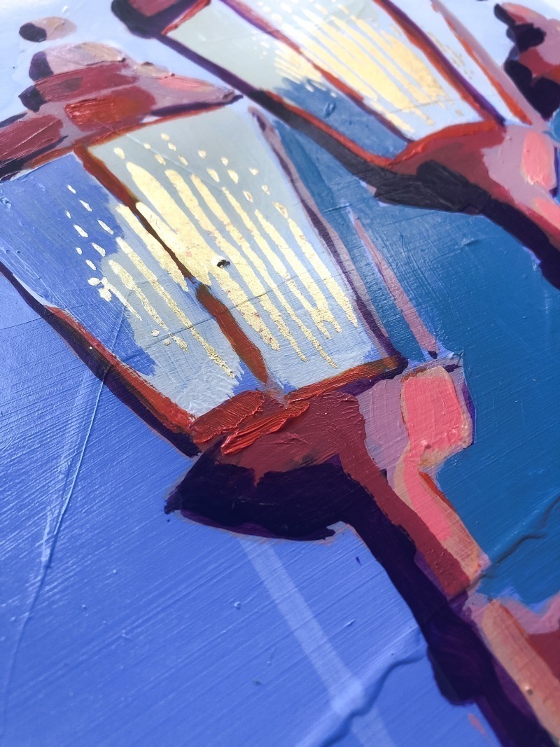 detail painting of a periwinkle and rust red painting of a street light