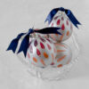 Midnight Glow hand painted christmas ornaments are painted with strokes of plum, magenta and apricot