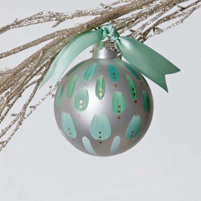 sage dreams christmas tree ornament is hand painted in soft green hues