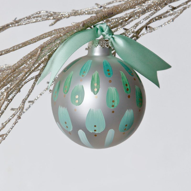 sage dreams christmas tree ornament is hand painted in soft green hues