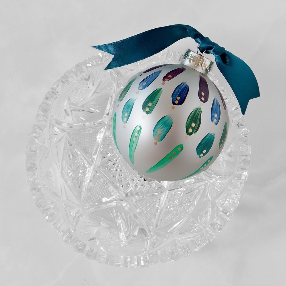 Steppin Out blue green hand painted ornament has all the flair of a peacock