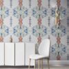 Linn grey bohemian wallpaper installed in a dining room with brass furniture.