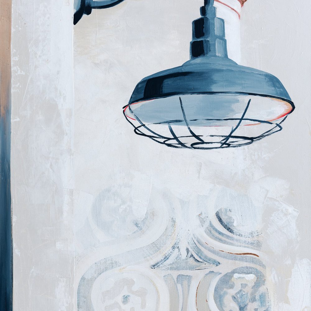 “Just Right Here,” by Teale Hatheway is an industrial street light painting in cream, blue and soft rust colors.