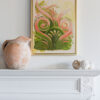 installation view - "Dissipate" is a pink, olive green and cream colored painting of a classical architectural detail by Teale Hatheway