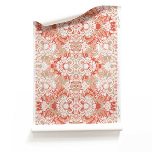 A roll of Carmen red and pink botanical wallpaper in colorway Redwood. It is an abstract floral fabric in rust, pink, brown and white colors. It's an ideal wallpaper for inviting dining rooms.