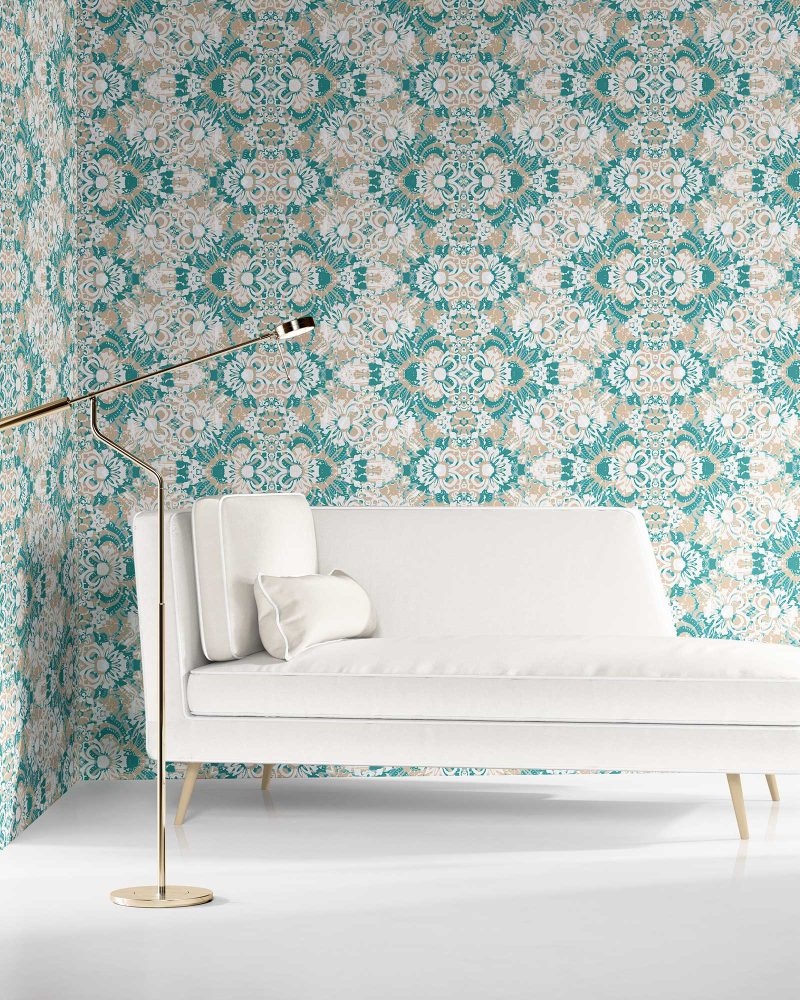 Carmen Inlay wallpaper in Surf colorway installed in a living room. It is an abstract floral pattern in ocean blue and sandy brown.