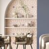 creatively wallpapered dining room nook brings style and color to a minimal space. Fern wallpaper in pink from Pearl & Maude