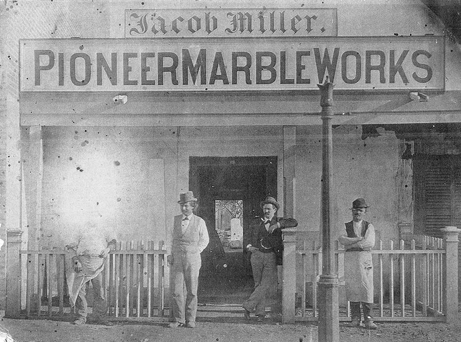 Jacob Miller - Los Angeles' first marble carver, outside his shop, Pioneer Marble Works. Approximately 1870.