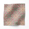 A swatch of Beaufort Sunburst Pattern linen fabric in the Boardwalk colorway of brown and magenta