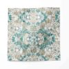 A swatch of Carmen Inlay linen fabric in colorway Surf. It is an abstract floral fabric in turquoise, brown and white colors. It's an ideal fabric for draperies.