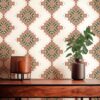 A close up of Desert diamonds wallpaper in cream and apricot colors installed in a living room. Medium sized repeat