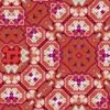 A detail of Marshan red ornate patterned fabric that blends Americana style with Eastern pattern motifs in a bohemian style fabric