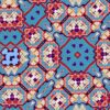 A detail of Marshan blue ornate patterned fabric that blends Americana style with Eastern pattern motifs in a bohemian style fabric