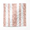 A swatch of Perigrene drapery fabric in colorway Dawn. It is a woven stripe fabric in pink, peach and white colors. It's an ideal fabric for draperies.