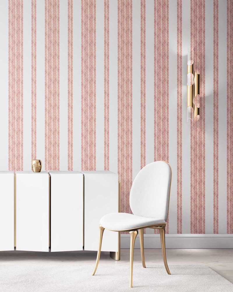 Perigrene wallpaper in colorway Dawn, installed in a bedroom. It's light colors are cheerful. It's pink and peach stripes are tailored and textural.