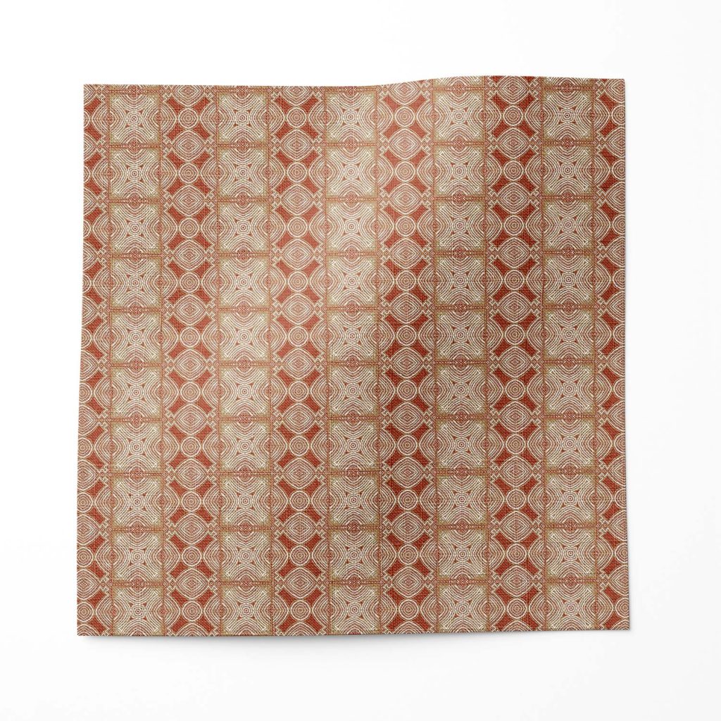 A swatch of "Ruguru" - an enchanting linen fabric pattern that showcases intricate linework, crafting a mesmerizing red tribal patterned fabric in a small, textural pattern.
