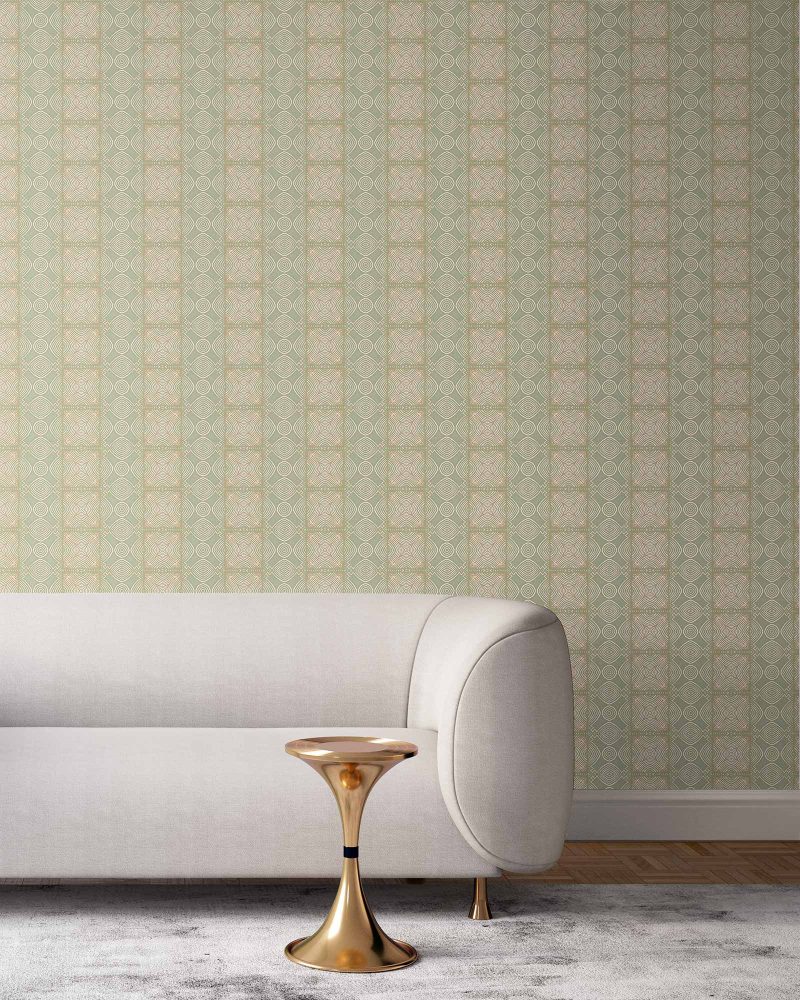 our Ruguru geometric tile wallpaper, with an intricate repeat, in the sage green, white and beige colorway. Installed on the wall of a room decorated with fine white linen sofa and high end furniture