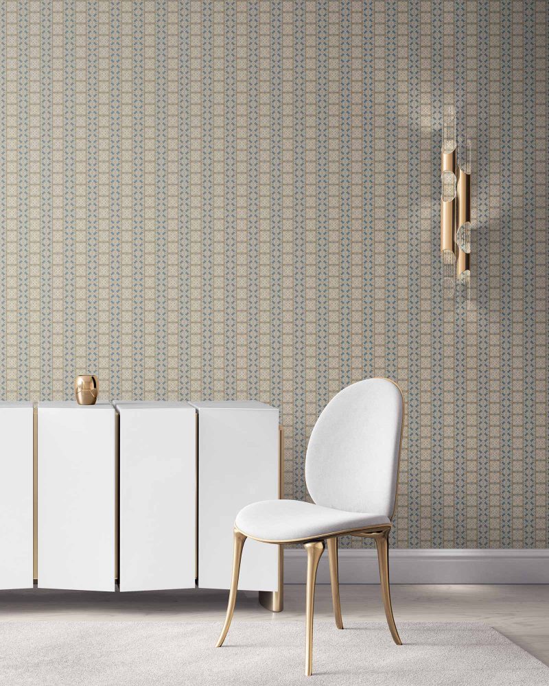 our Ruguru geometric tile wallpaper, in a small repeat, in the Spring Blue and beige colorway. Installed on the wall of a room decorated with fine white velvet seating and high end furniture