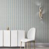 our Ruguru geometric tile wallpaper, in a small repeat, in the Spring Blue and beige colorway. Installed on the wall of a room decorated with fine white velvet seating and high end furniture
