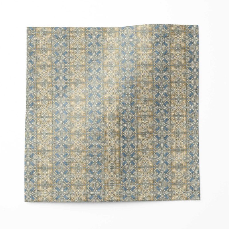 A swatch of "Ruguru" - an enchanting linen fabric pattern that showcases intricate linework, crafting a mesmerizing blue tribal patterned fabric in a small, textural pattern.
