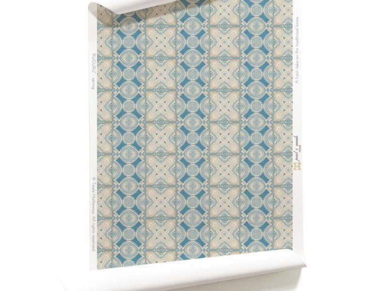 A roll of Ruguru intricate geometric tile wallpaper in blue and brown