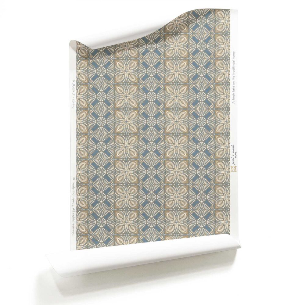 A roll of Ruguru, Ornate Artisan Wallpaper, in Dusty Blue. Art Deco Wallpaper Medium Scale on a white background