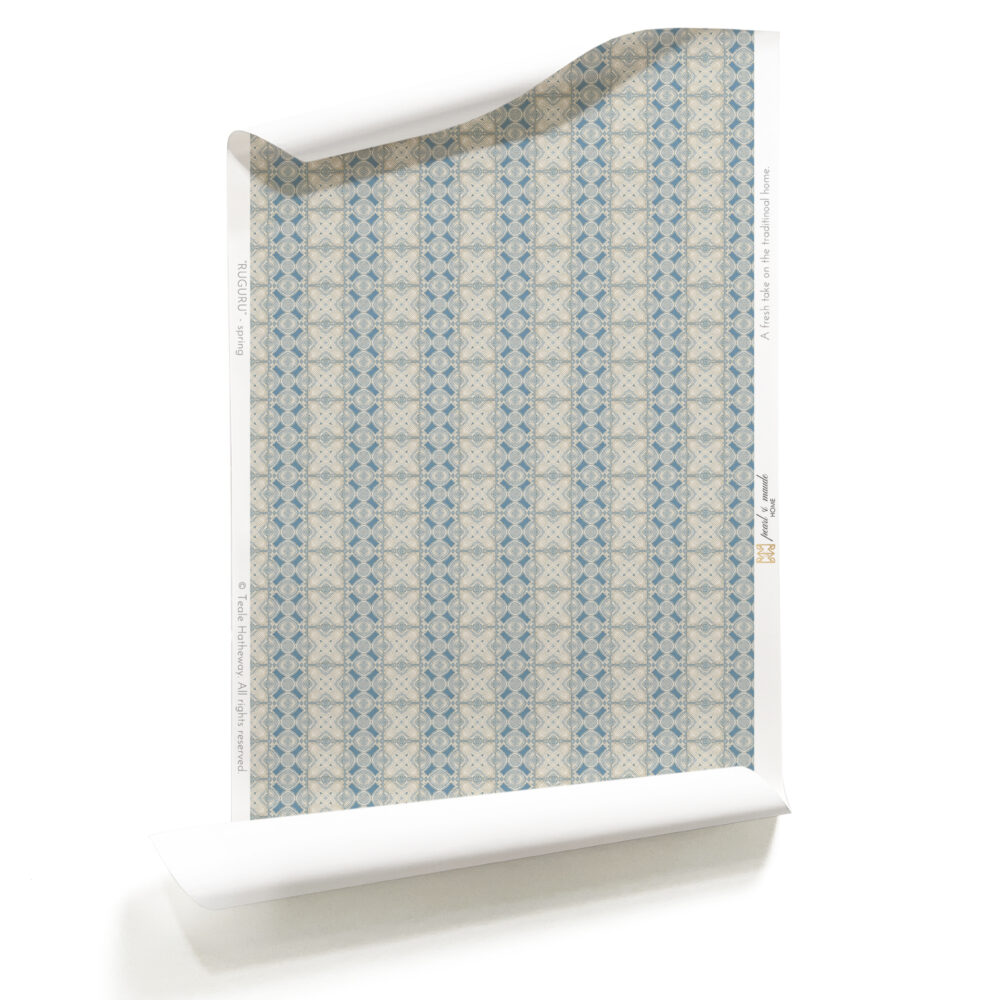 A roll of Ruguru dusty blue Art Deco wallpaper, small scale in blue and brown