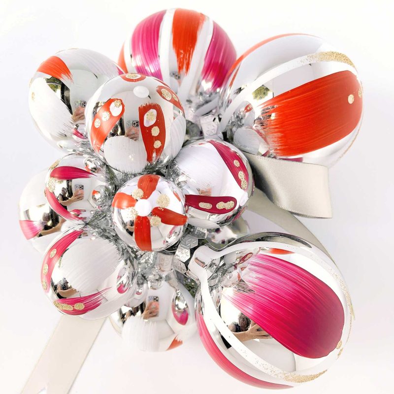 Hand painted Christmas ornament cluster in red, magenta and white with gold glitter and ivory satin ribbon.