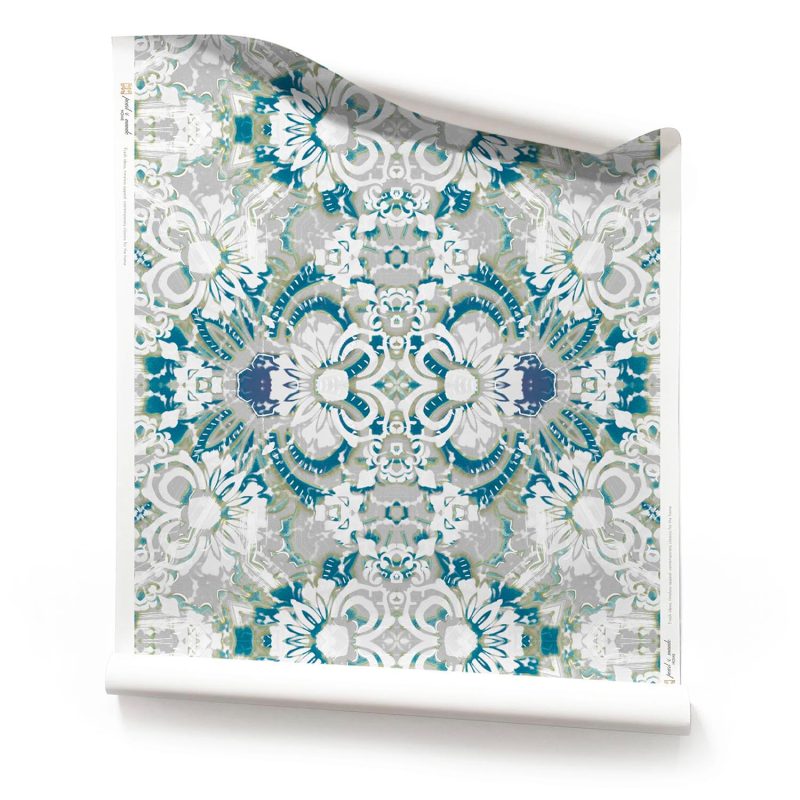 a roll of Carmen blue grey wallpaper. It is a light, airy floral pattern wallpaper