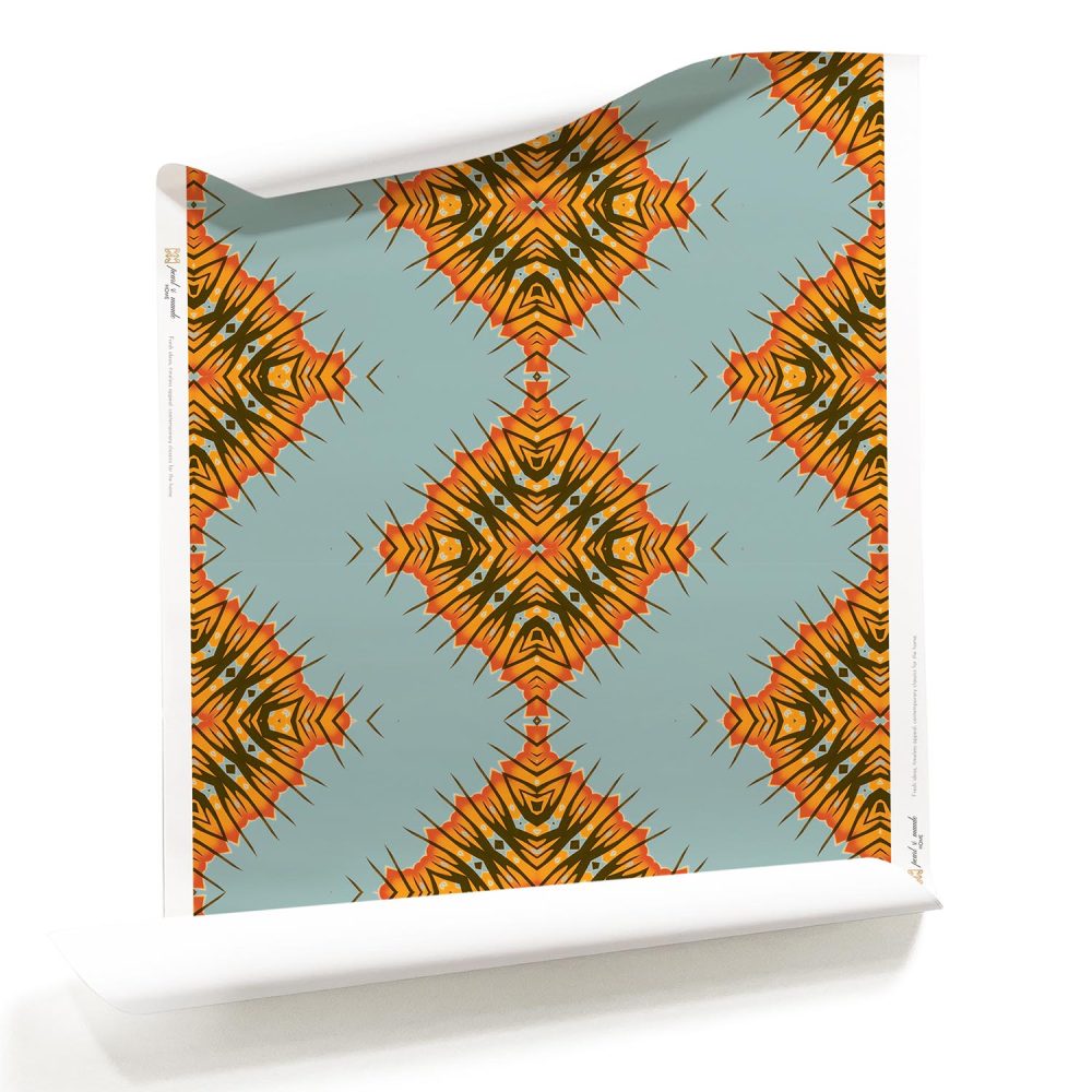 Roll of orange, olive and blue geometric wallpaper. Design - Desert Diamonds by Pearl and Maude
