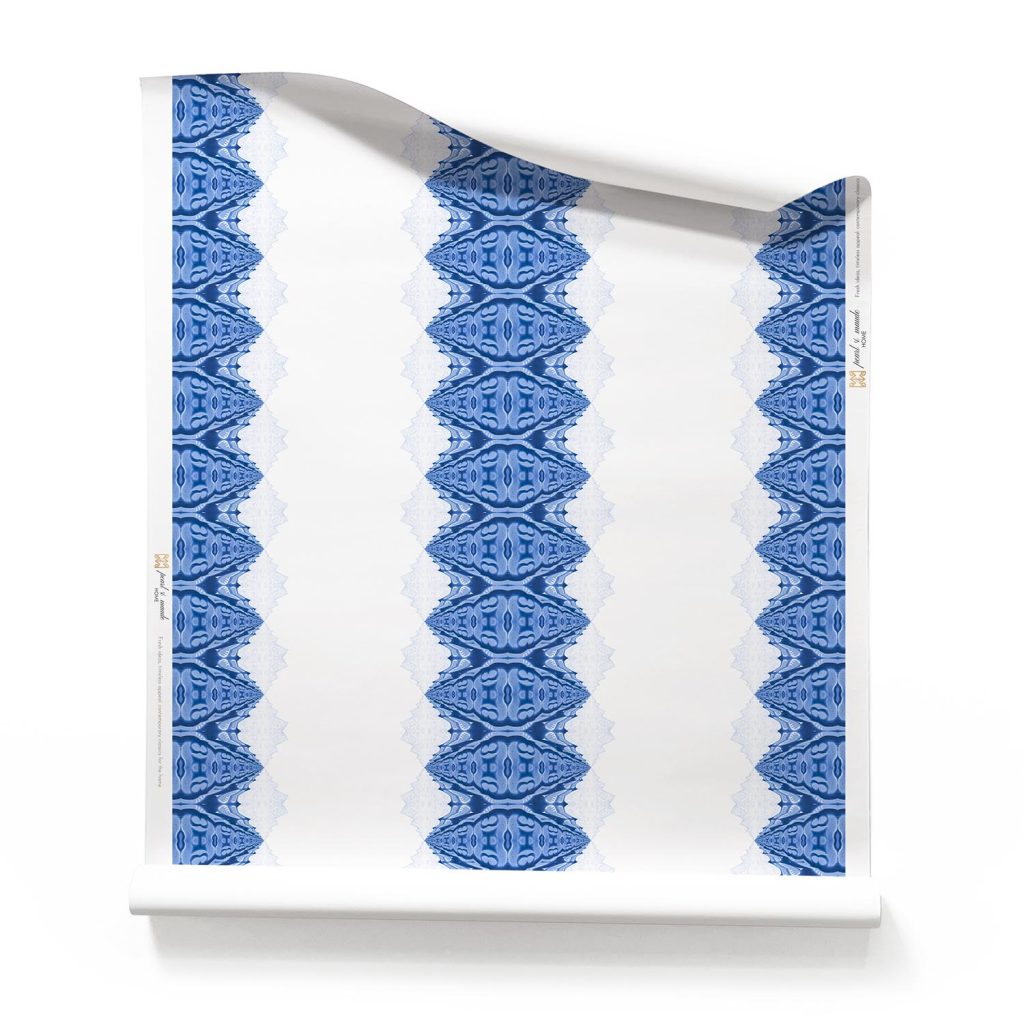 A roll of Lou striped blue and white wallpaper on a white background - by Pearl & Maude. Lou Blue White nautical Striped Wallpaper Roll - clay coated wallpaper - Pearl & Maude