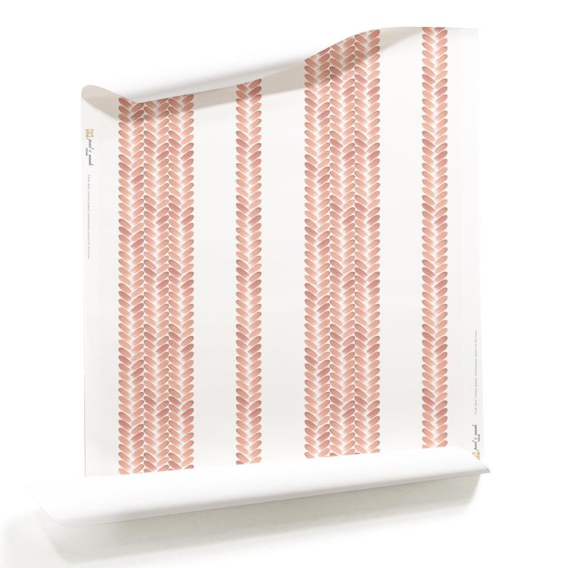 Roll of Perigrene pink striped wallpaper showing the herringbone pattern on the white background