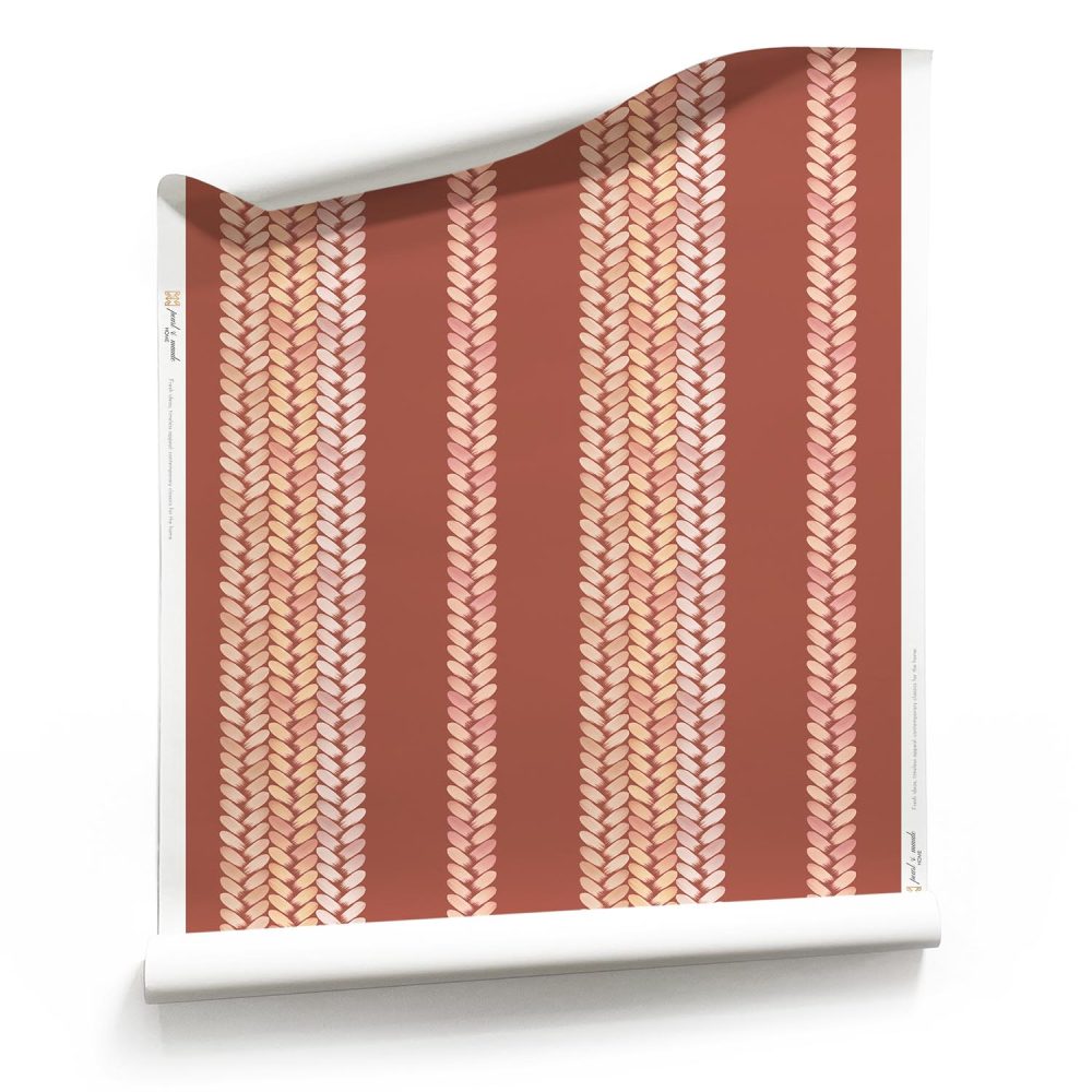 Roll of Perigrene striped wallpaper showing the braided pattern and warm natural colors of the Saltillo colorway.