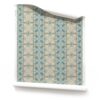 A roll of Ruguru, Ornate Artisan Wallpaper, in Dusty Blue. Art Deco Wallpaper Medium Scale on a beige background. A roll of medium scale Ruguru Beige and Blue Art Deco Wallpaper