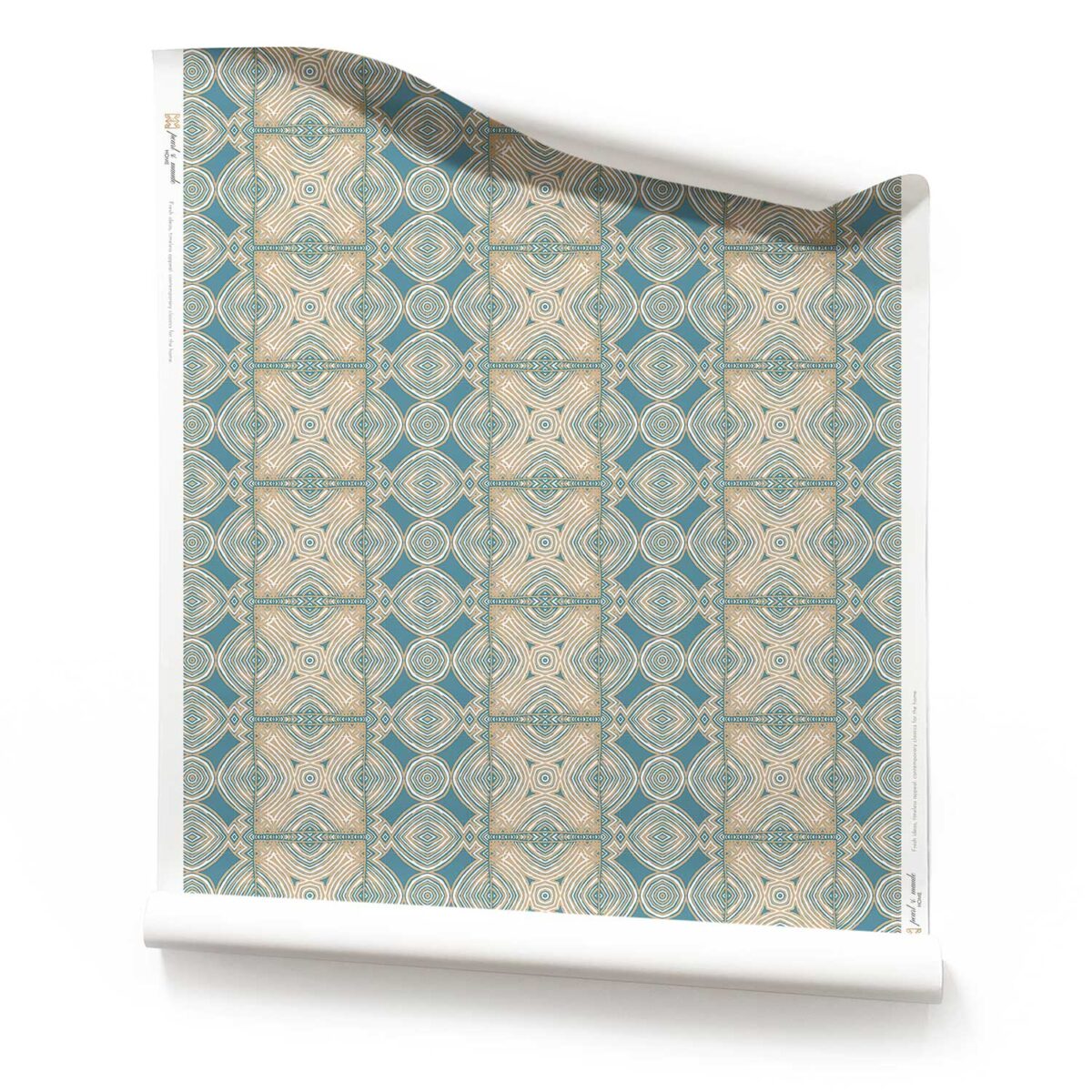 A roll of Ruguru, Ornate Artisan Wallpaper, in Dusty Blue. Art Deco Wallpaper Medium Scale on a beige background. A roll of medium scale Ruguru Beige and Blue Art Deco Wallpaper