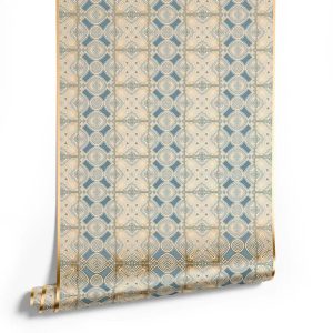 A roll of gorgeous geometric patterned blue and gold metallic wallpaper from Pearl and Maude