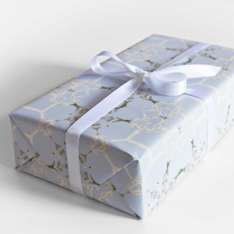 A gift wrapped with Arachne periwinkle chinoiserie gift wrap
