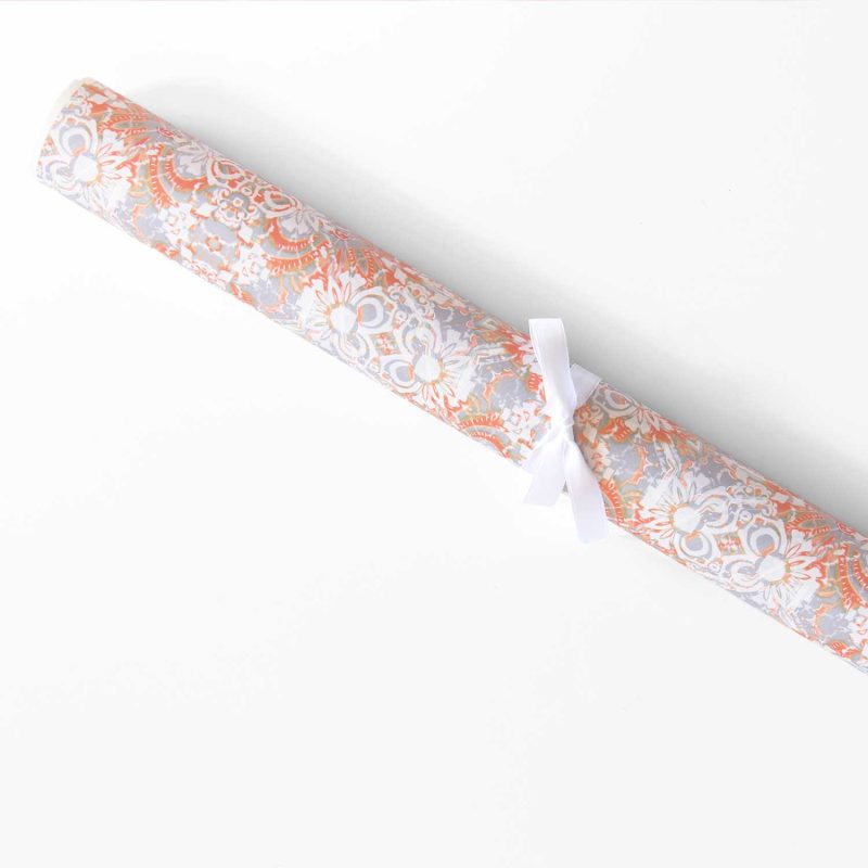a roll of Carmen Apricot floral wrapping paper